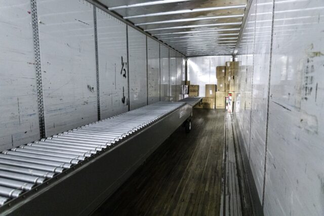 bestreach rigid drive out conveyor in trailer